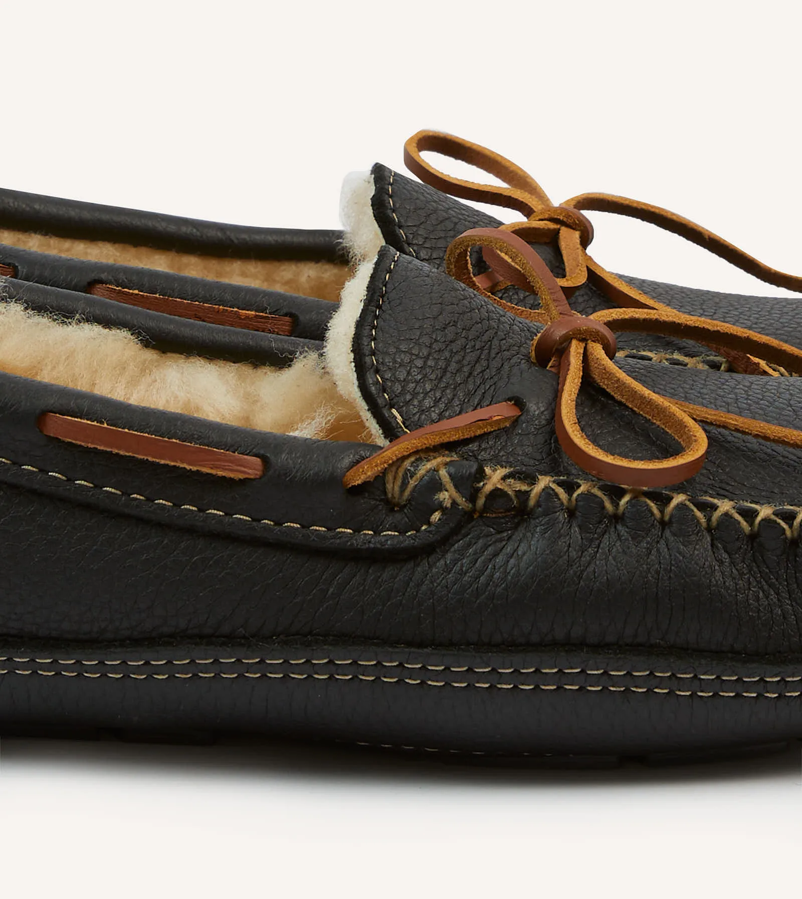 Minnetonka Black Sheepskin Lined Moose Slipper